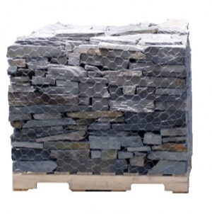 Pallet of stacked dark gray slate stone wrapped in wire mesh, Maine Slate 1-3 inch