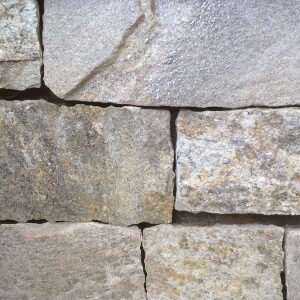 Close-up of gray Manchester natural stone wall texture