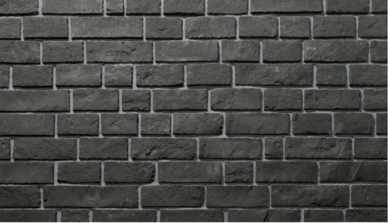 Dark charcoal Obsidian edge-cut stone veneer panel in a brick pattern