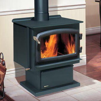 Black freestanding wood stove with glass viewing window on a tile hearth