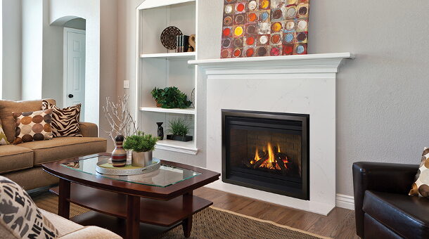 White mantel surround gas fireplace with built-in shelving in a living room