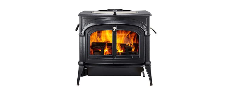 Black cast-iron freestanding wood stove with double glass doors and nickel trim on white background.